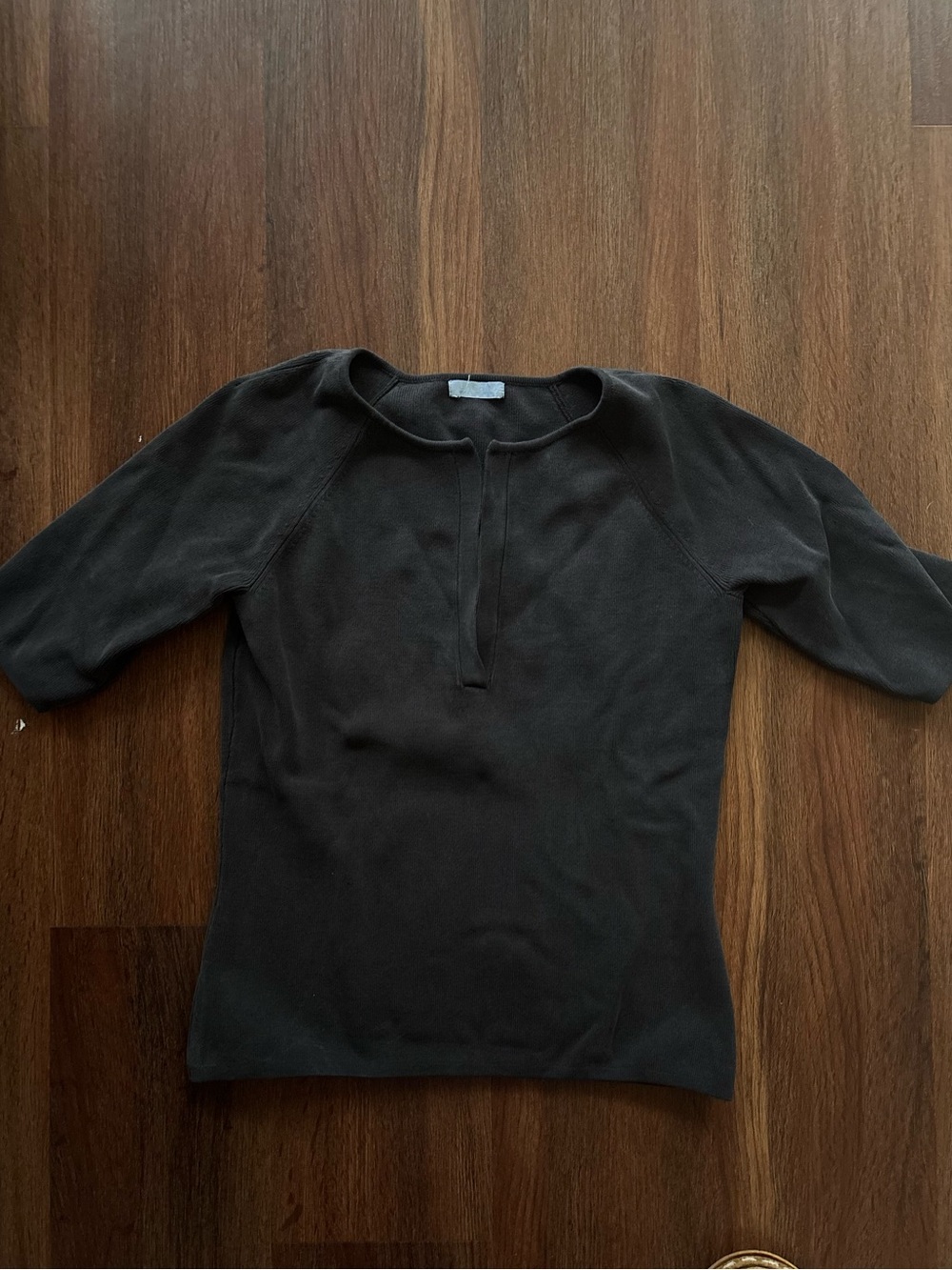 Vintage 90s Urchin Mark Eisin Women's Black Short-Sleeve Knit Top
